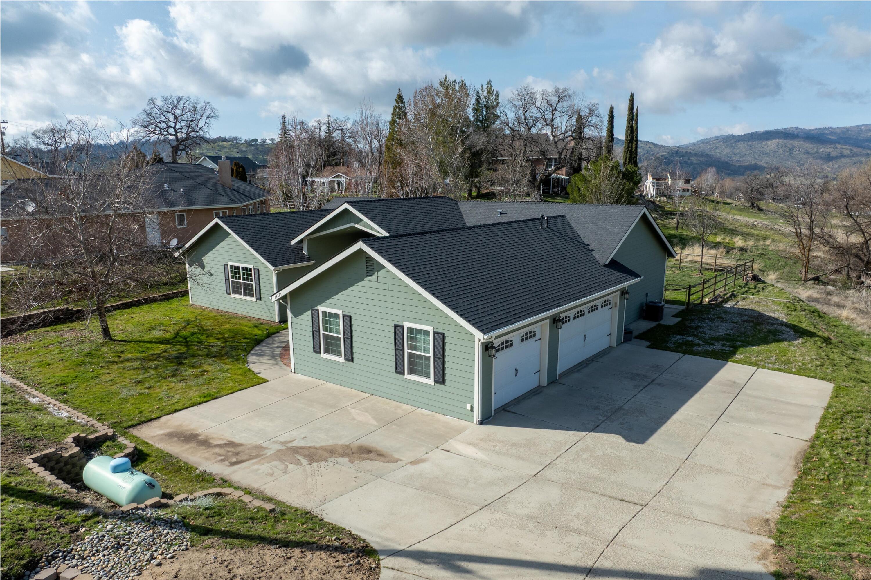 28321 Pimlico Way Tehachapi, CA 93561 - Photo 1 of 23 a aerial view of a house with a yard