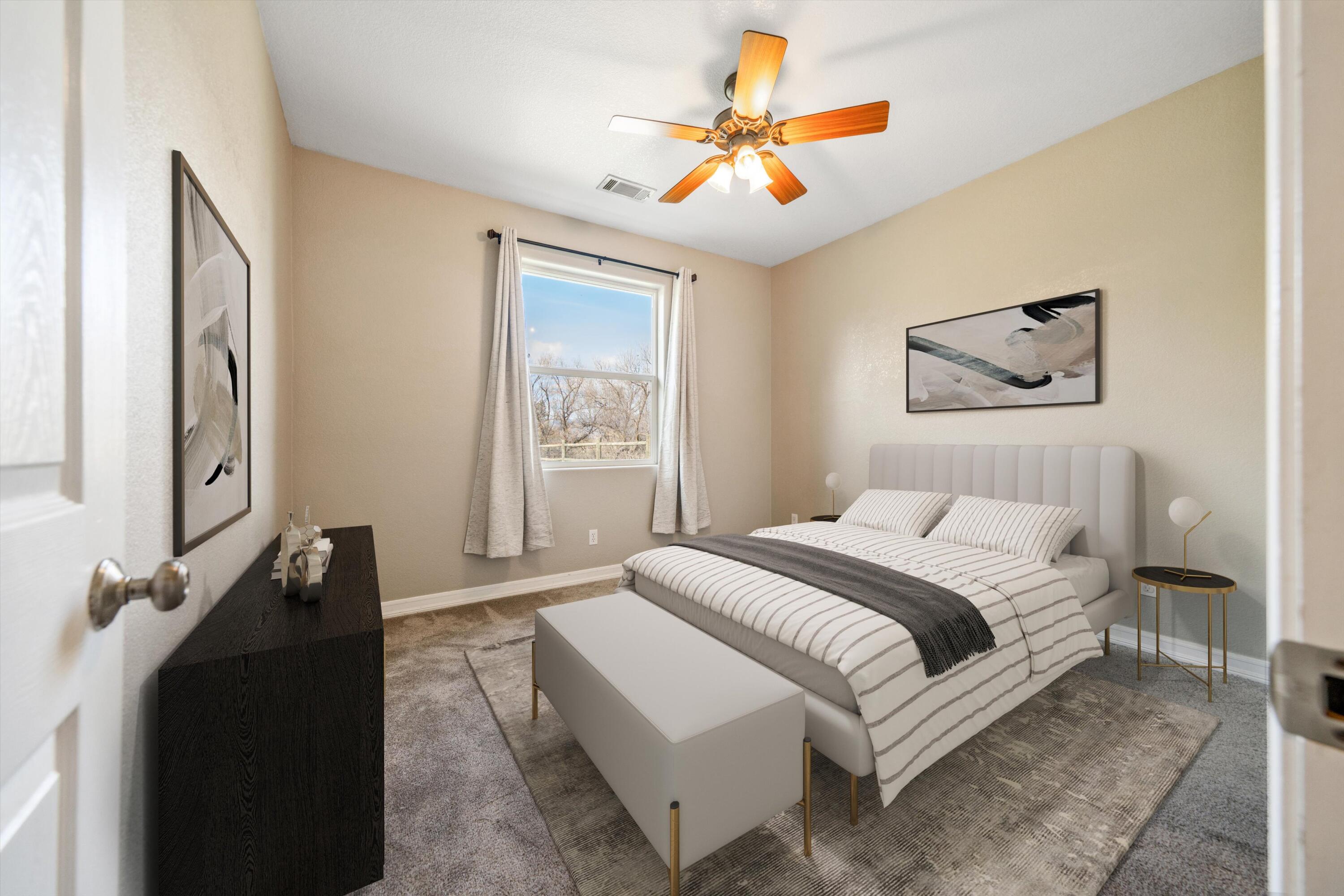 28321 Pimlico Way Tehachapi, CA 93561 - Photo 12 of 23 a bedroom with a bed and a painting on the wall