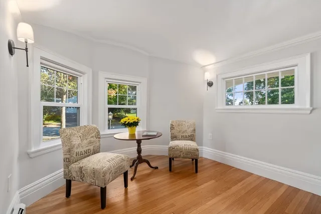 a kitchen with granite countertop a refrigerator and a stove top oven