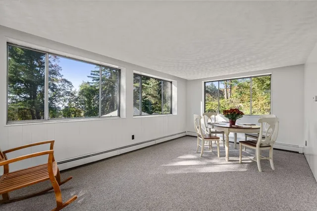 a view of a bathroom with a window and a sink