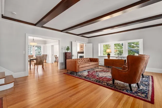 a living room with furniture and a table
