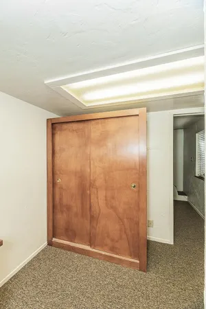 a room with water heater and a window