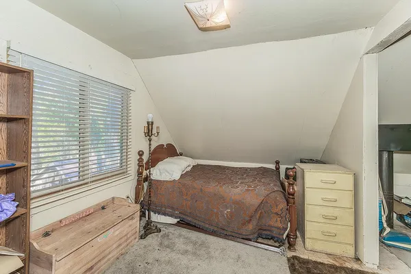 a room with furniture and a window