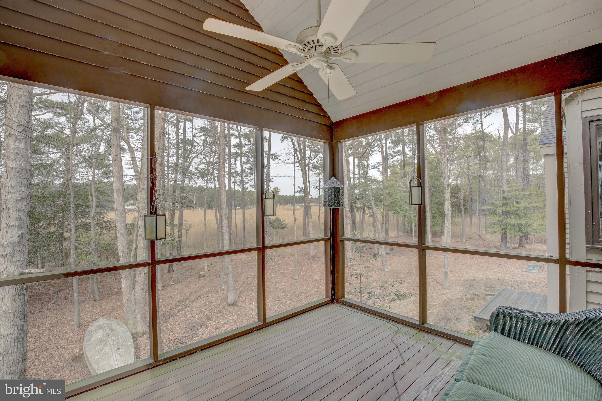 4958 Ashley Road Rock Hall, MD 21661 - Photo 16 of 50 A generous screened in porch