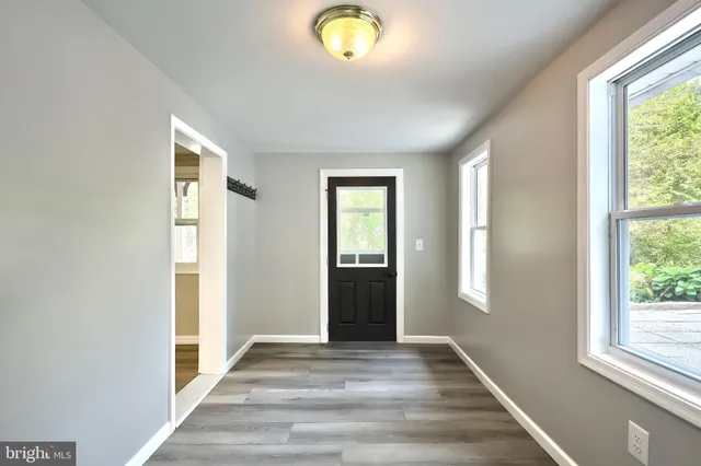 a view of a hallway with entryway