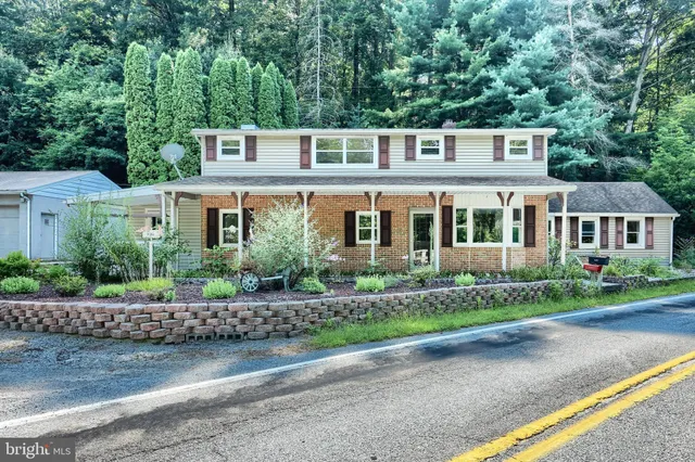 a house view with a garden space