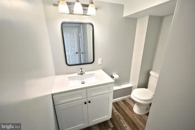 a view of a storage & utility room with a window