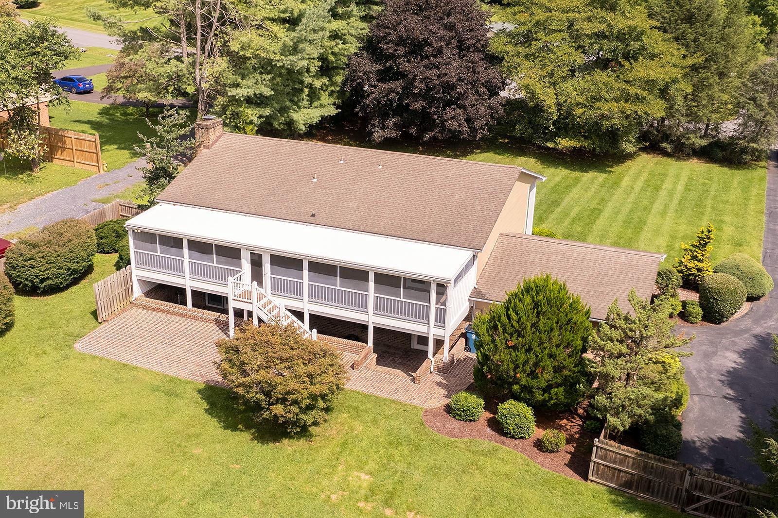 127 Stonebrook Road Winchester, VA 22602 - Photo 3 of 64 42 ft screened in porch with new carpet