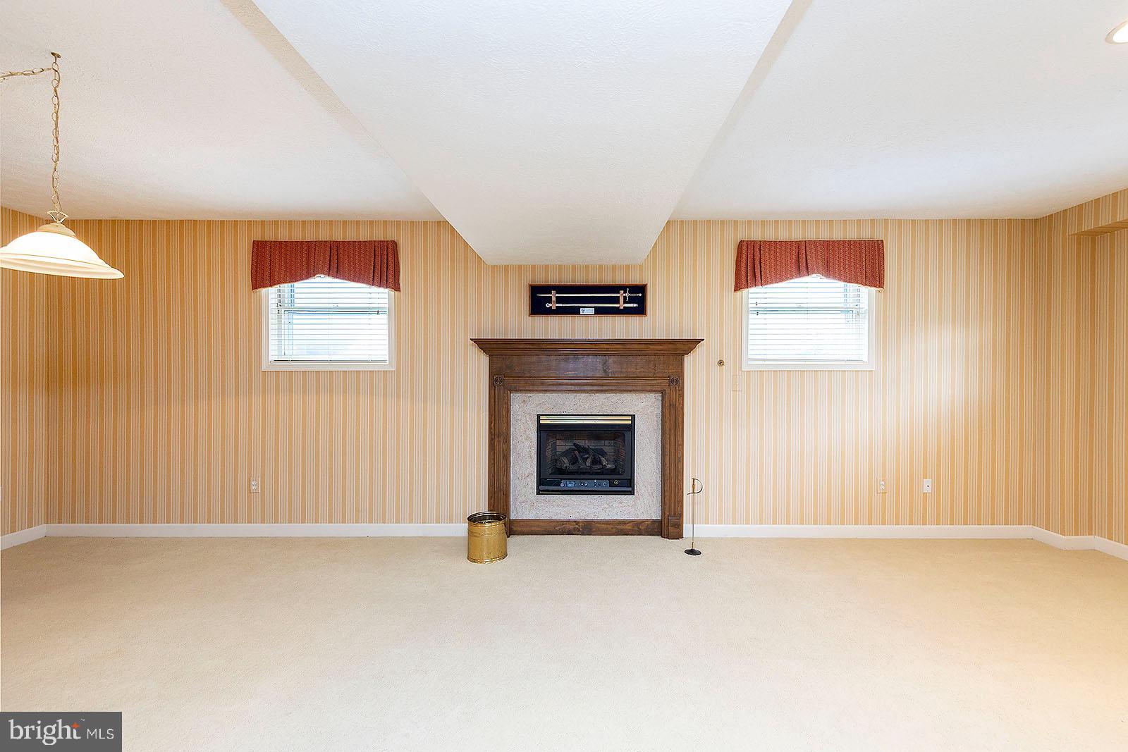 127 Stonebrook Road Winchester, VA 22602 - Photo 44 of 64 Family room gas fireplace