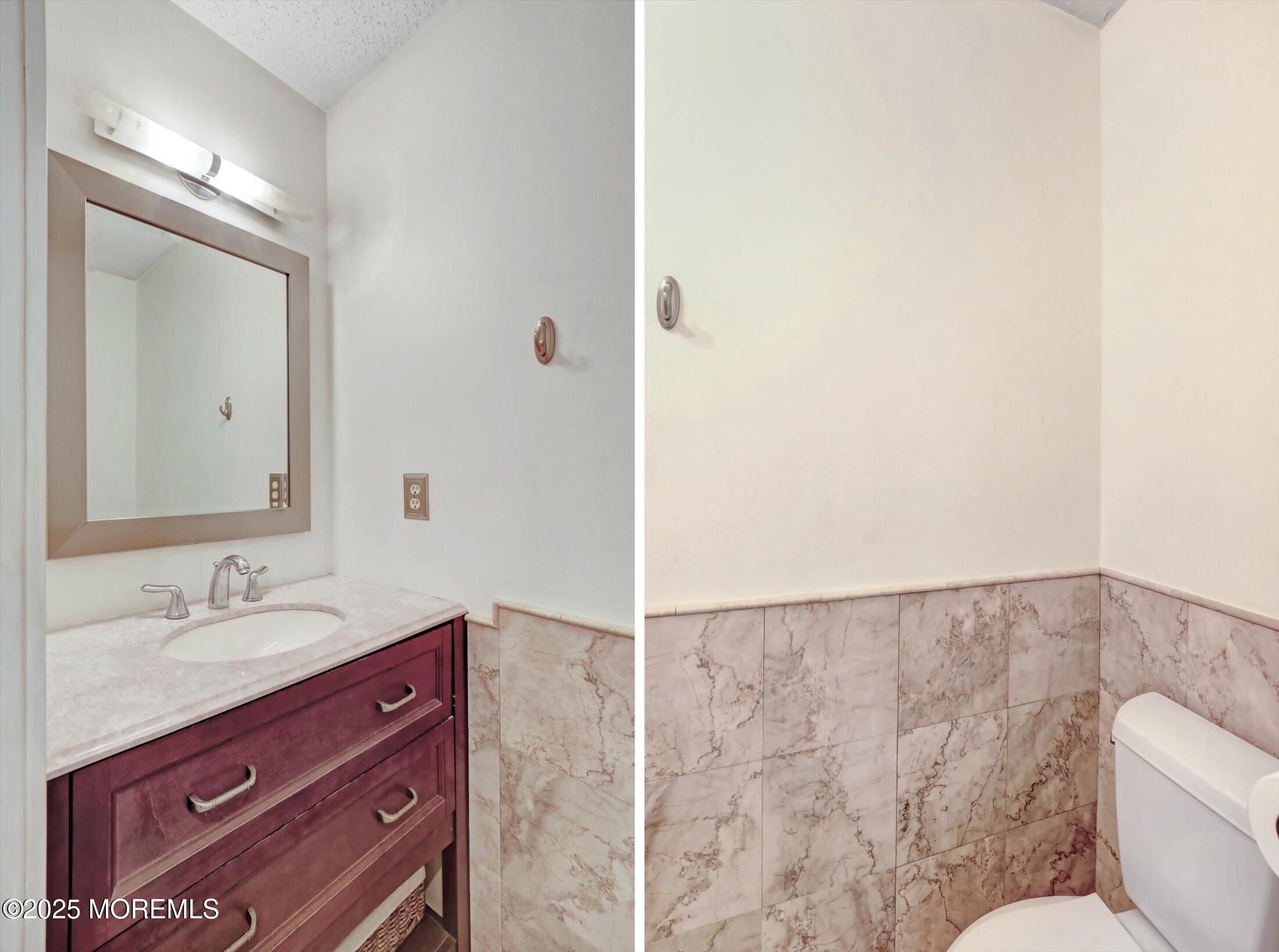 95 Azalea Circle Jackson, NJ 08527 - Photo 22 of 38 a bathroom with a sink and a mirror