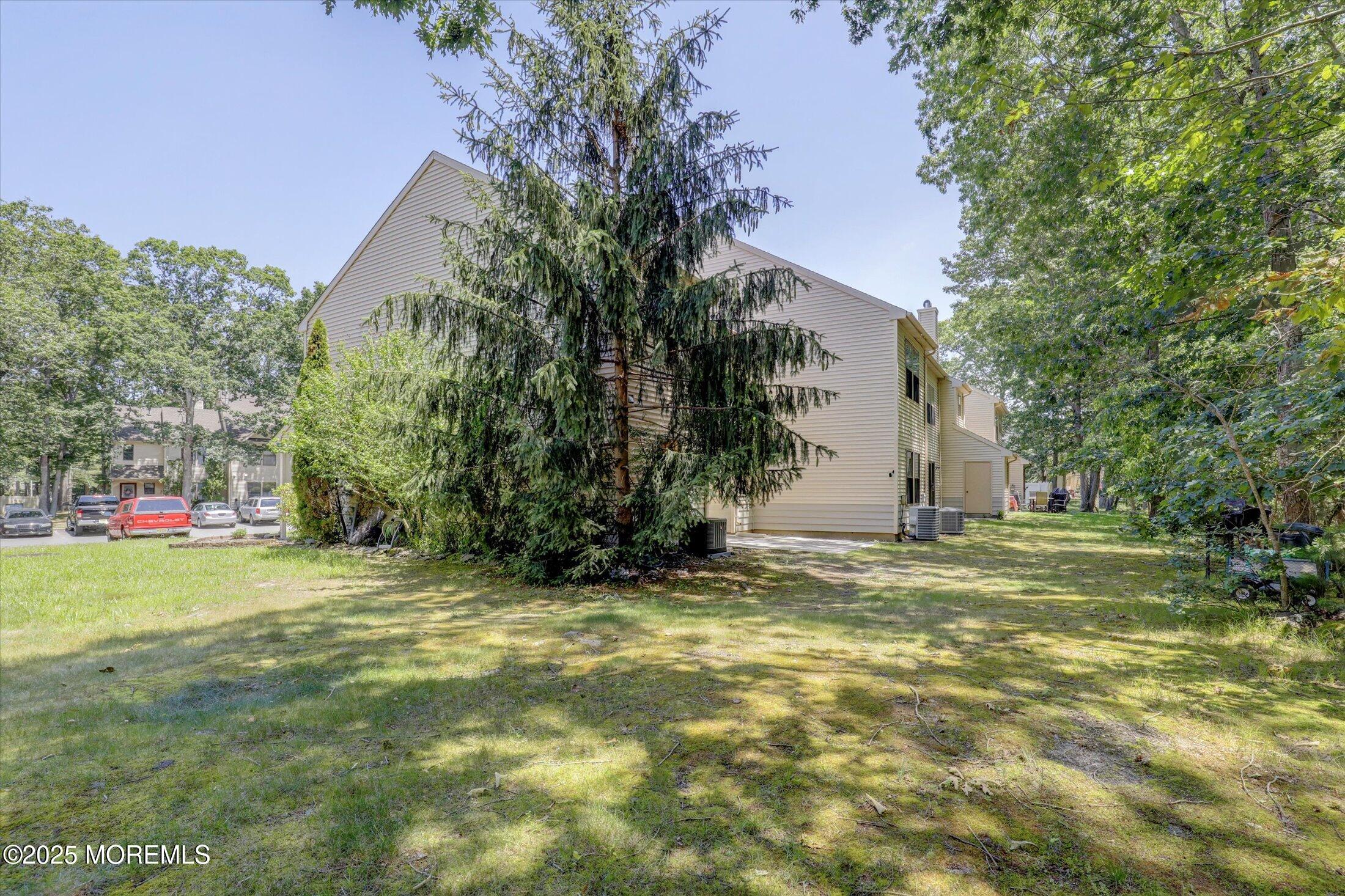 95 Azalea Circle Jackson, NJ 08527 - Photo 33 of 38 a view of a trees in a yard