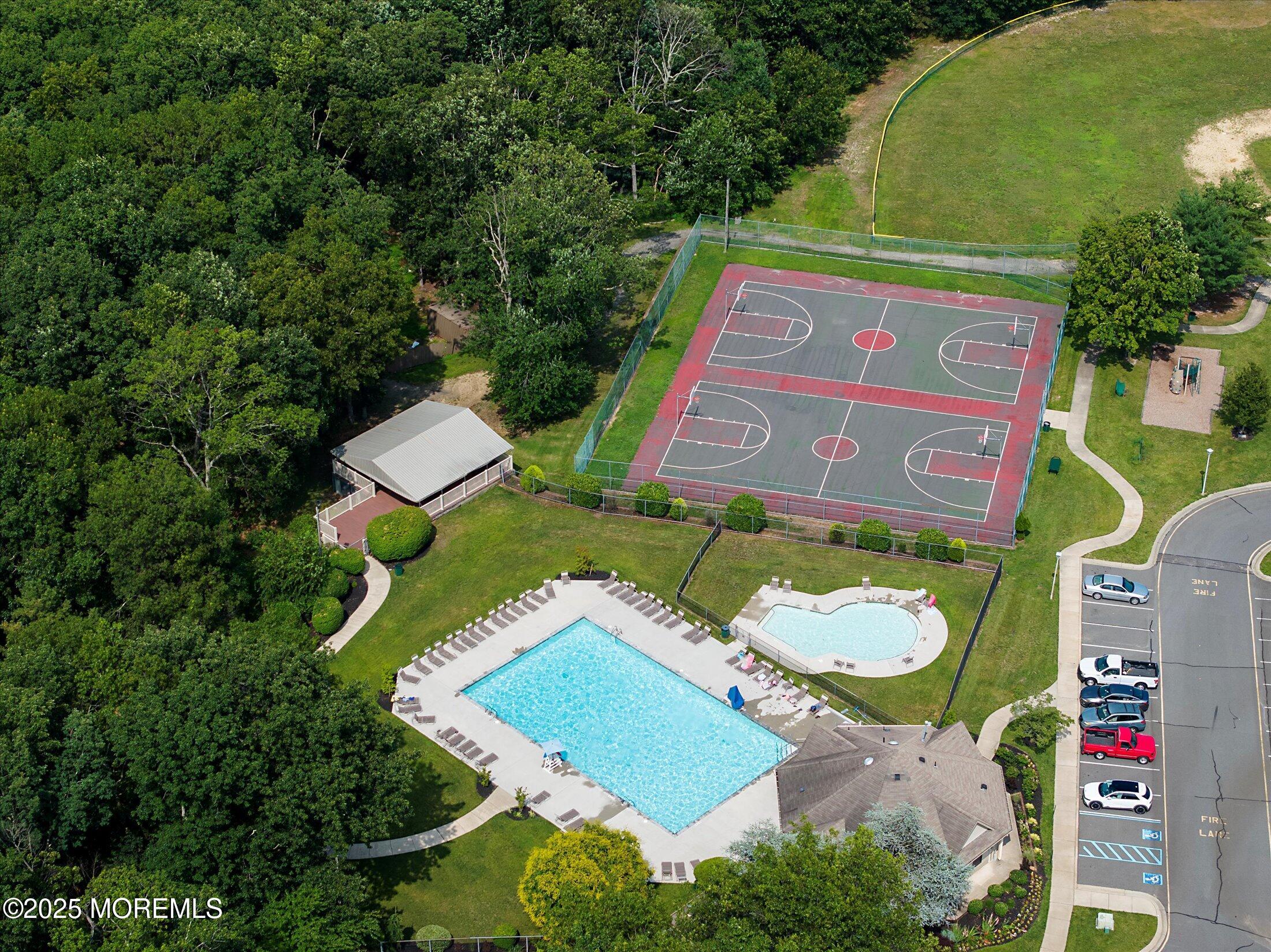 95 Azalea Circle Jackson, NJ 08527 - Photo 34 of 38 an aerial view of a chairs and table in the patio
