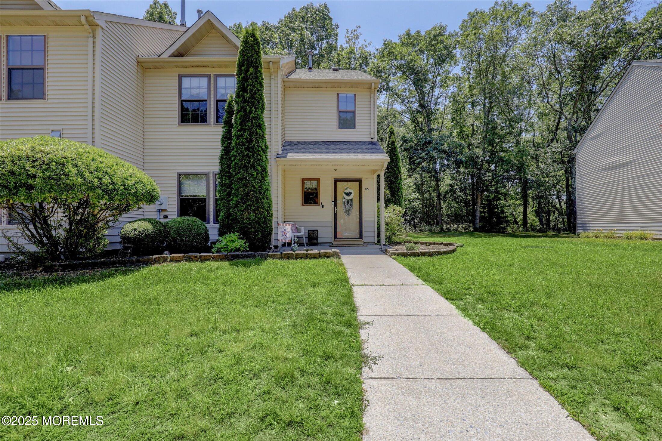 95 Azalea Circle Jackson, NJ 08527 - Photo 5 of 38 a front view of a house with garden