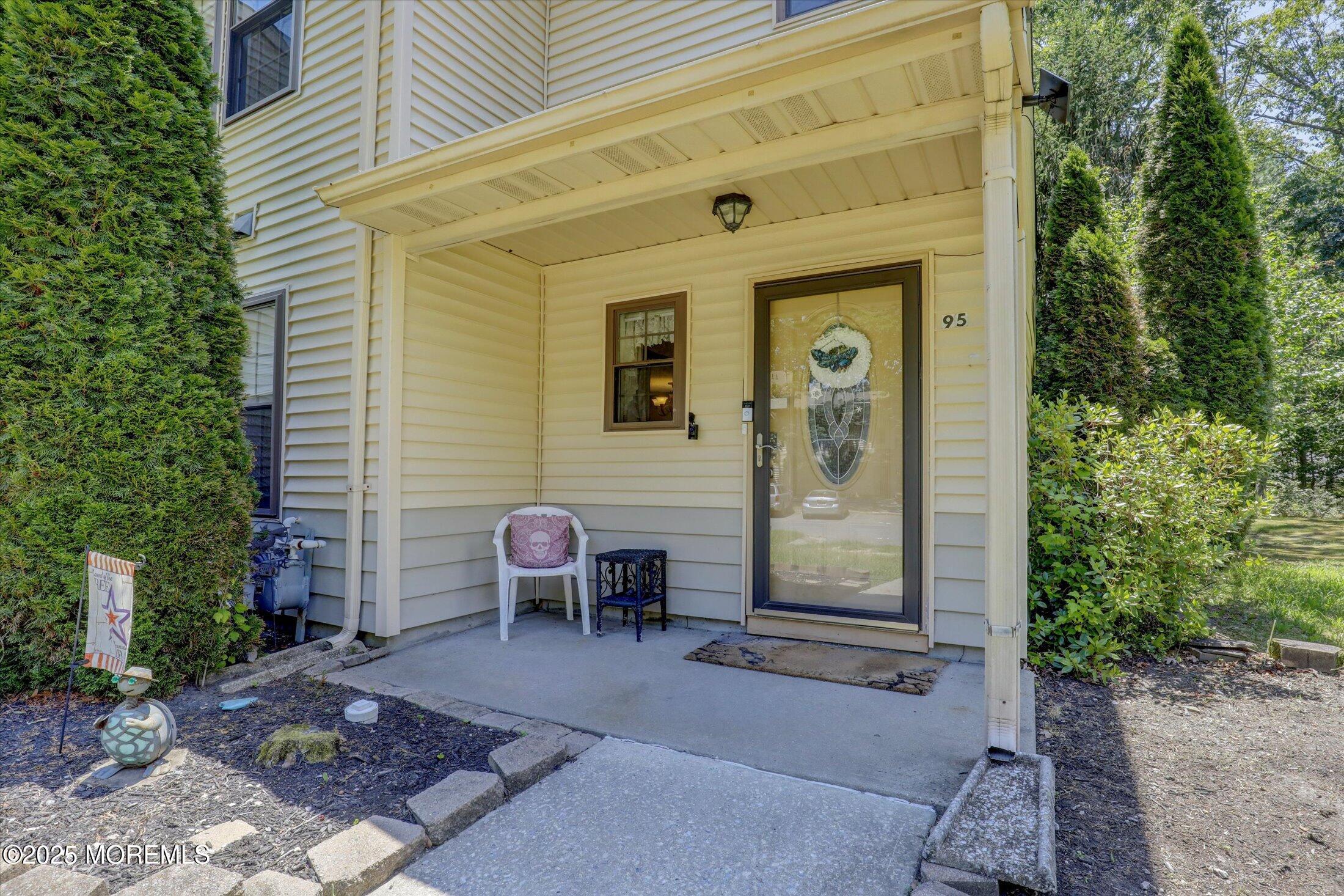 95 Azalea Circle Jackson, NJ 08527 - Photo 7 of 38 a front view of a house with outdoor seating