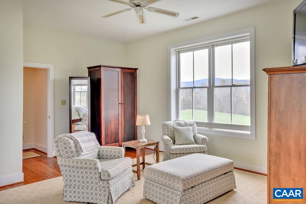 4543 Garth Road Charlottesville, VA 22901 - Photo 28 of 50 a living room with furniture and a window