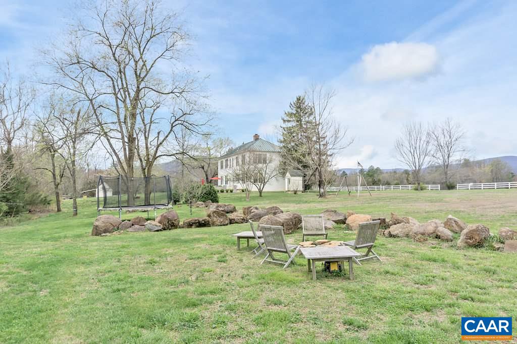 4543 Garth Road Charlottesville, VA 22901 - Photo 41 of 50 a garden with trees in the background