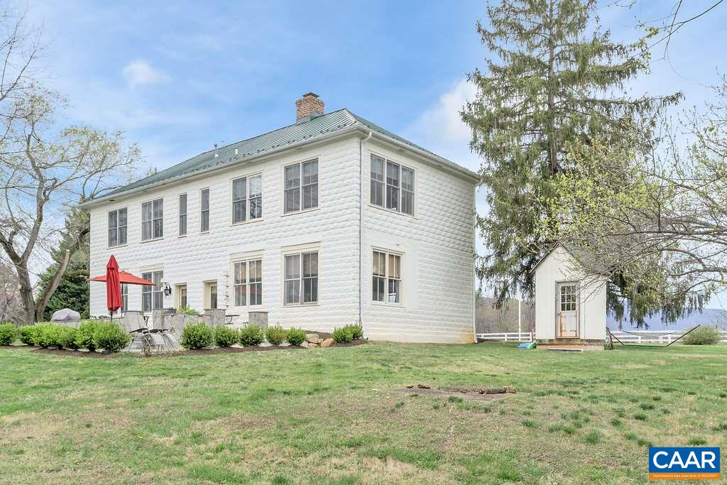 4543 Garth Road Charlottesville, VA 22901 - Photo 45 of 50 a front view of a house with a garden