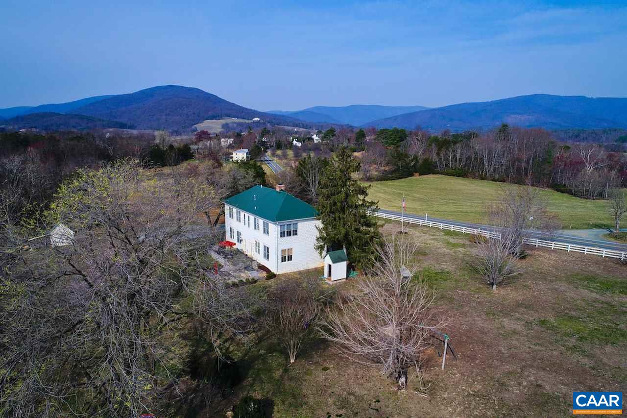 4543 Garth Road Charlottesville, VA 22901 - Photo 47 of 50 a view of a house with a mountain and a forest