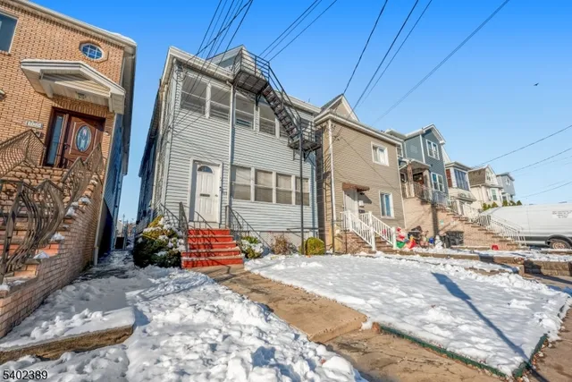 a front view of a building with street view