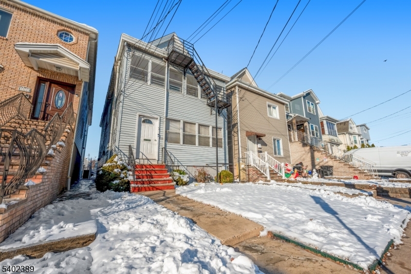 525 Maple Avenue Elizabeth, NJ 07202 - Photo 2 of 17 a front view of a building with street view