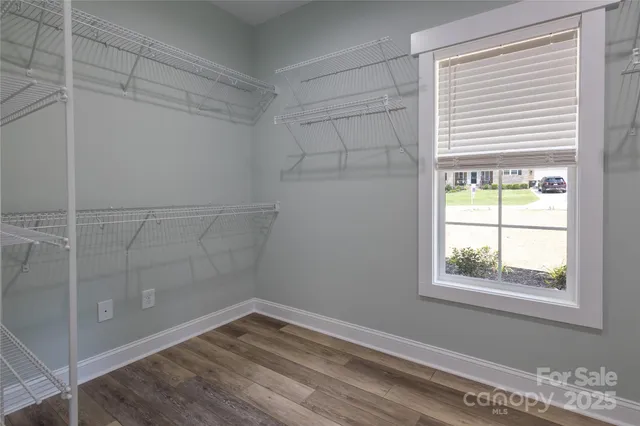 a view of a room that has a window in it