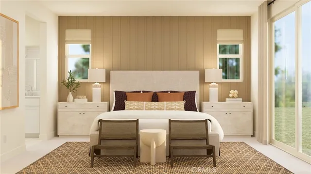 a bedroom with a large bed and a table