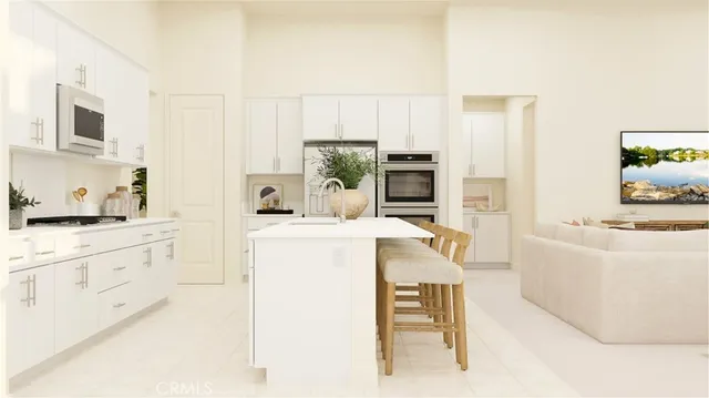 a kitchen that has a cabinets and appliances