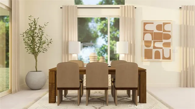a dining room with furniture and window