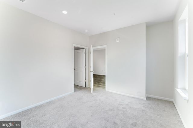 an empty room with an entryway