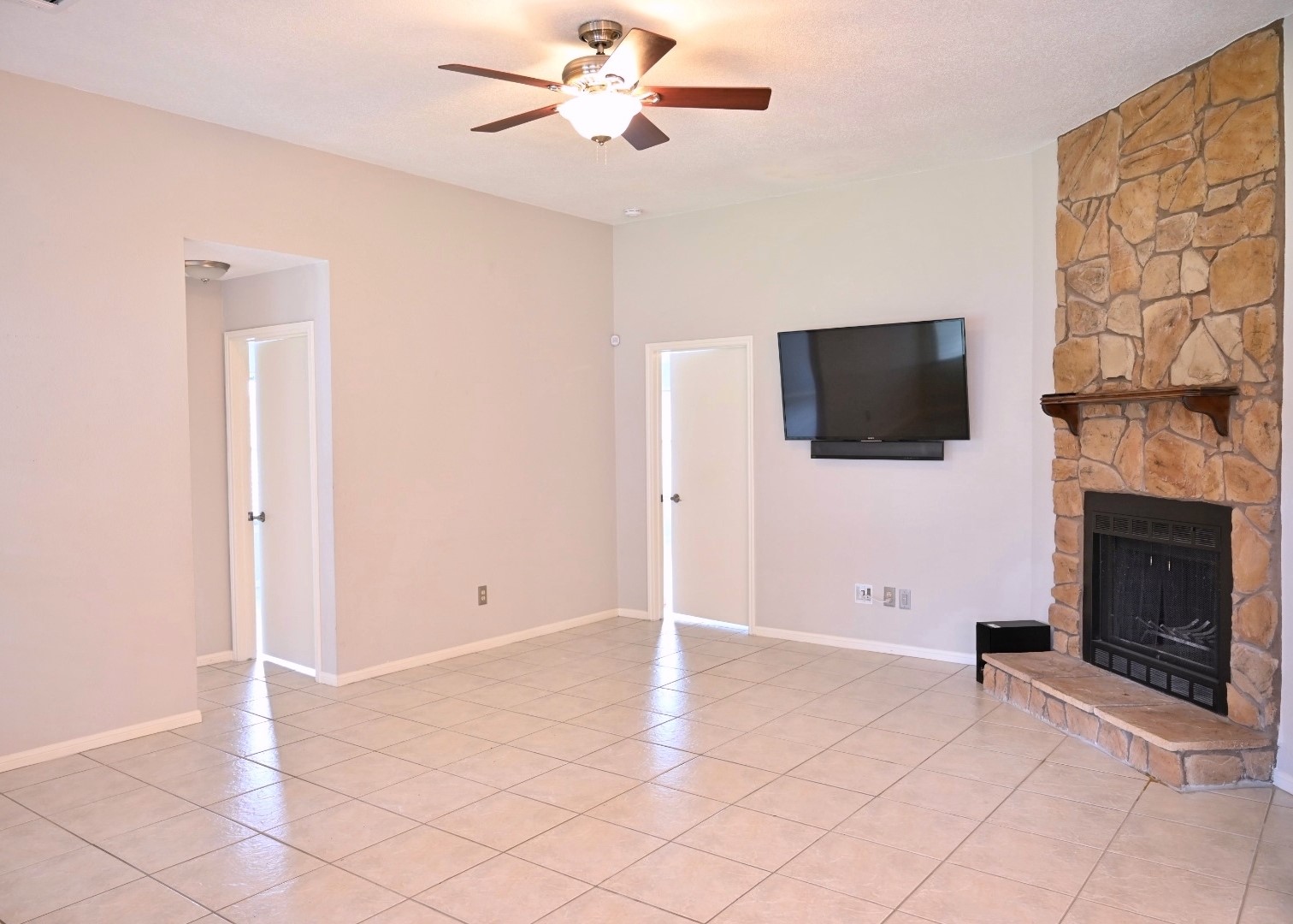 10207 Wayward Wind Lane Houston, TX 77064 - Photo 14 of 35 a view of a livingroom with a flat screen tv