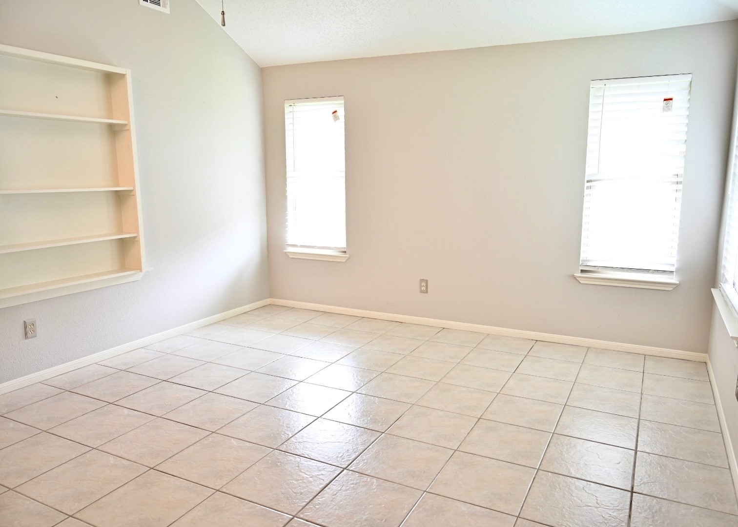 10207 Wayward Wind Lane Houston, TX 77064 - Photo 16 of 35 a view of an empty room and window