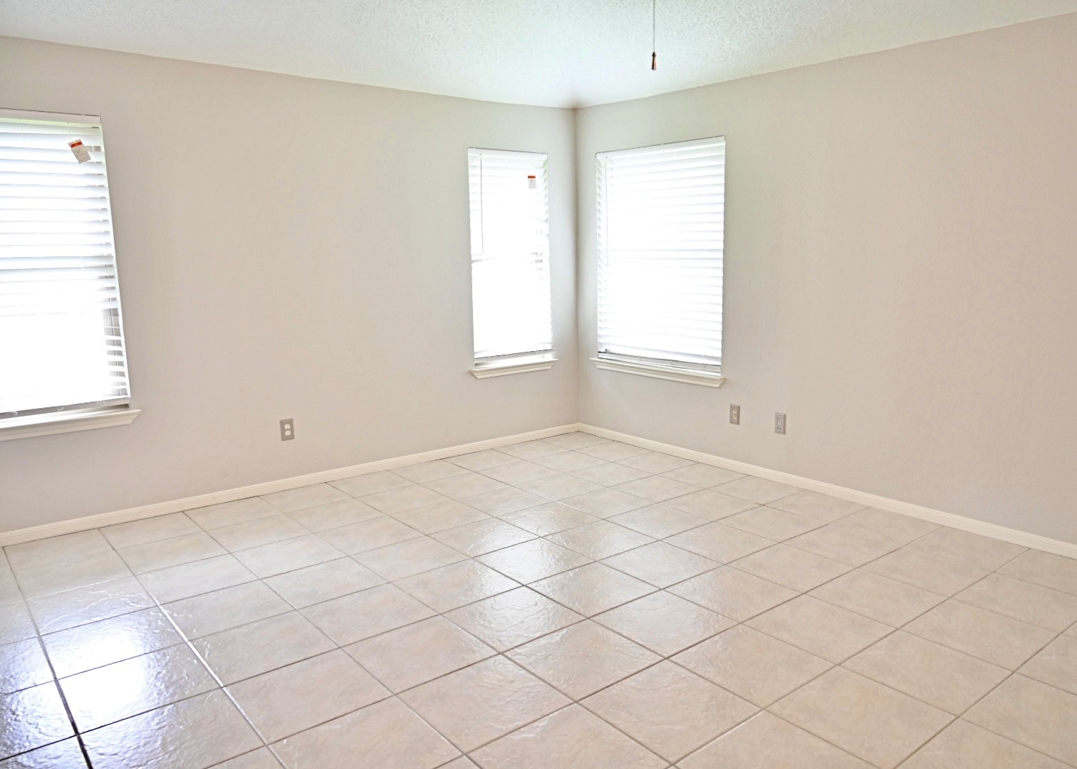 10207 Wayward Wind Lane Houston, TX 77064 - Photo 18 of 35 an empty room with windows