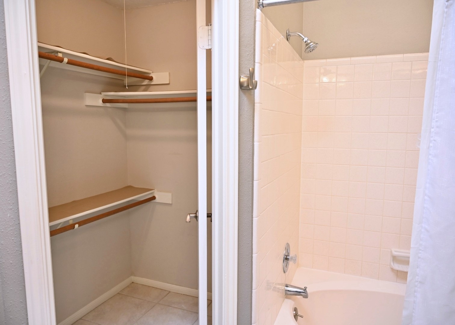 10207 Wayward Wind Lane Houston, TX 77064 - Photo 22 of 35 a bathroom with a glass shower door