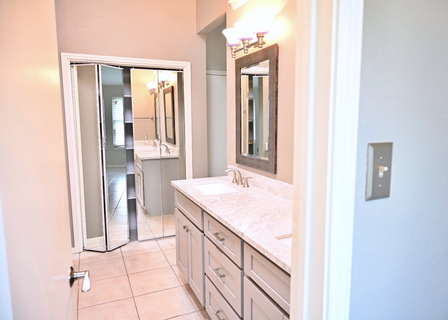 10207 Wayward Wind Lane Houston, TX 77064 - Photo 24 of 35 a bathroom with a sink and a mirror