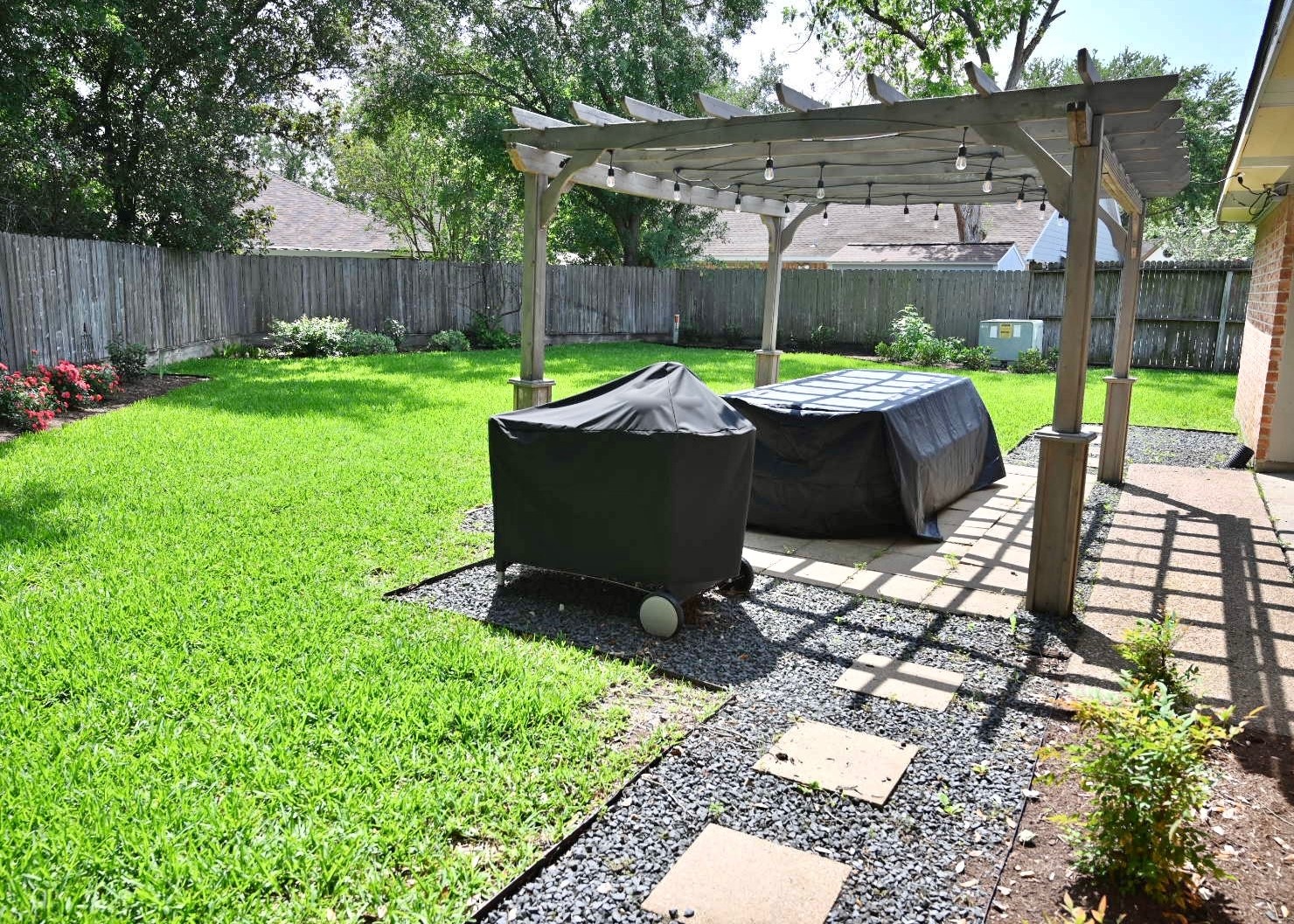 10207 Wayward Wind Lane Houston, TX 77064 - Photo 33 of 35 a view of a chairs and table in backyard
