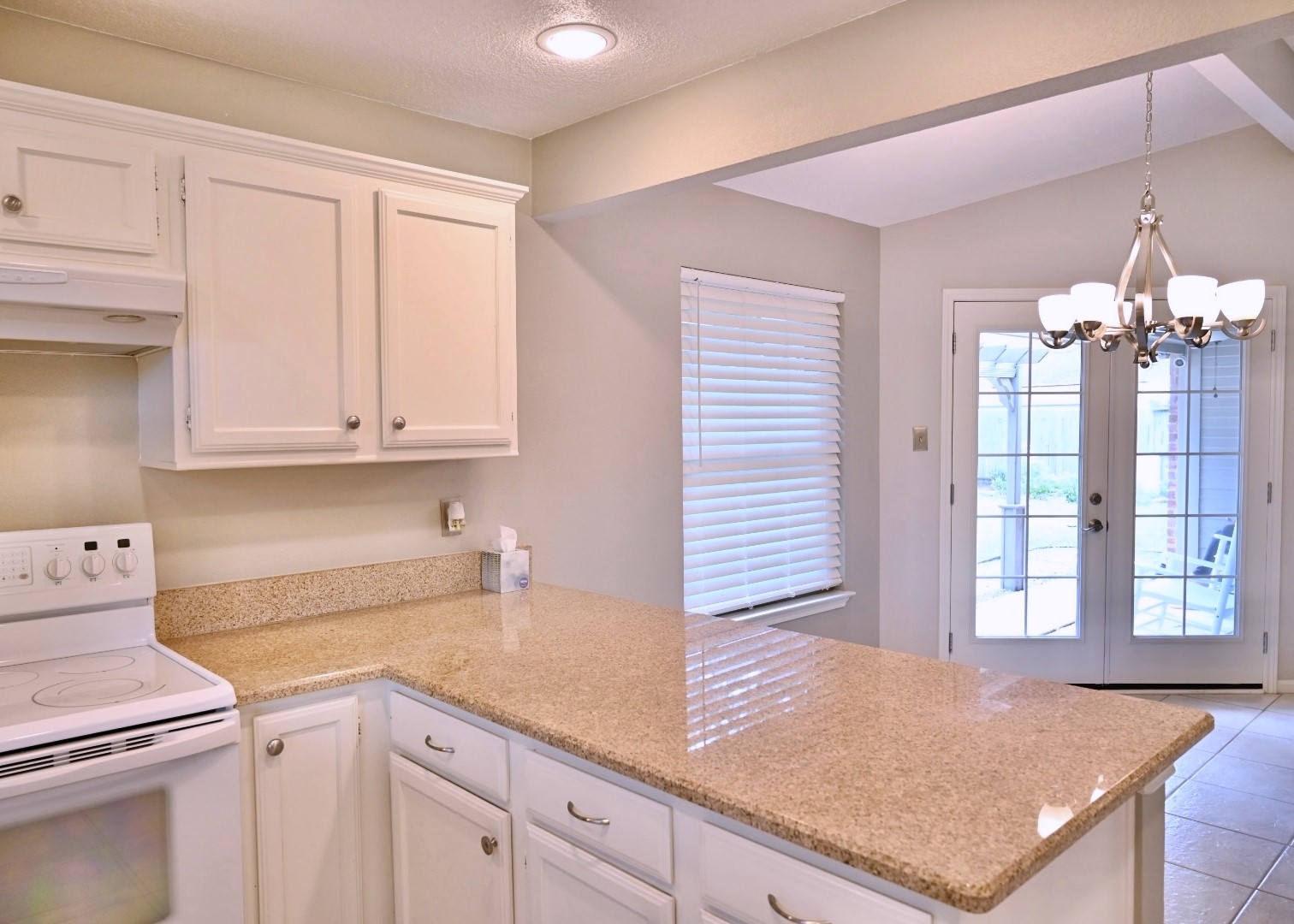 10207 Wayward Wind Lane Houston, TX 77064 - Photo 9 of 35 a kitchen with a sink and cabinets
