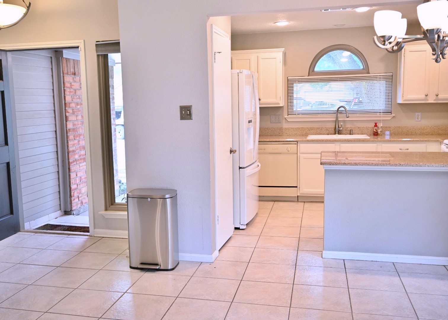 10207 Wayward Wind Lane Houston, TX 77064 - Photo 10 of 35 a bathroom with a sink a vanity and a mirror