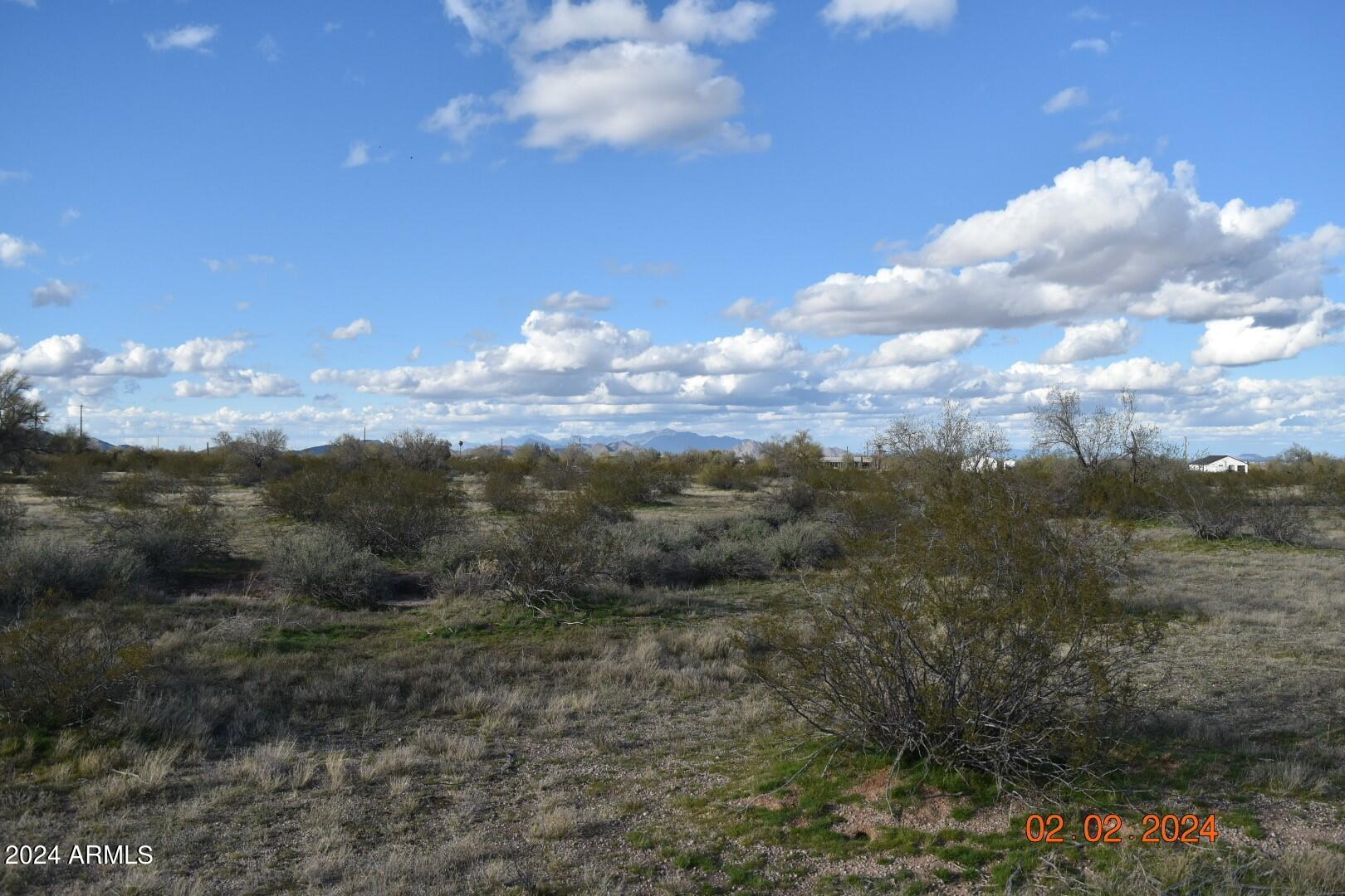 2 West Agate Road, Unit PARCEL 1 Maricopa, AZ 85139 - Photo 11 of 12 a view of a city with lush green forest