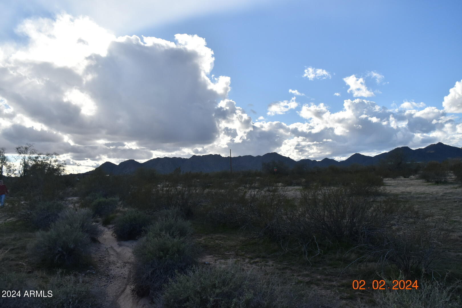 2 West Agate Road, Unit PARCEL 1 Maricopa, AZ 85139 - Photo 10 of 12 a view of a lake in middle of forest