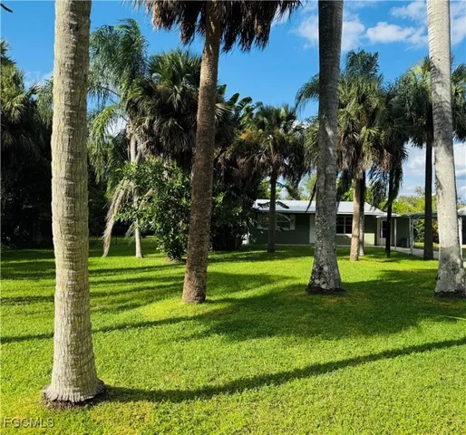 a view of a backyard with a garden