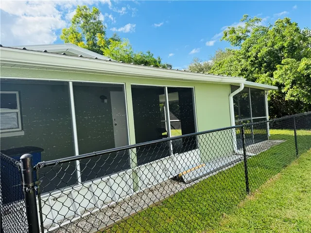 a view of a backyard with garden
