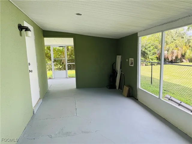 a view of an empty room with a sliding door