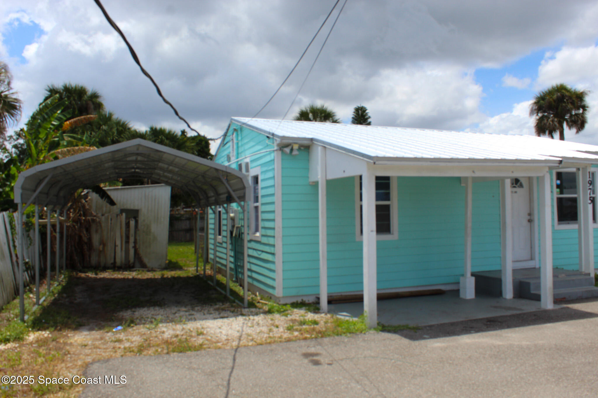 1975 Aurora Road Melbourne, FL 32935 - Photo 2 of 6 Leftside