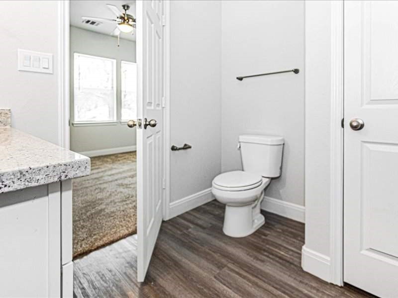 7838 Booker Street, Unit B Houston, TX 77028 - Photo 17 of 28 a bathroom with a toilet and a shower