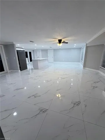 a view of a livingroom with a furniture