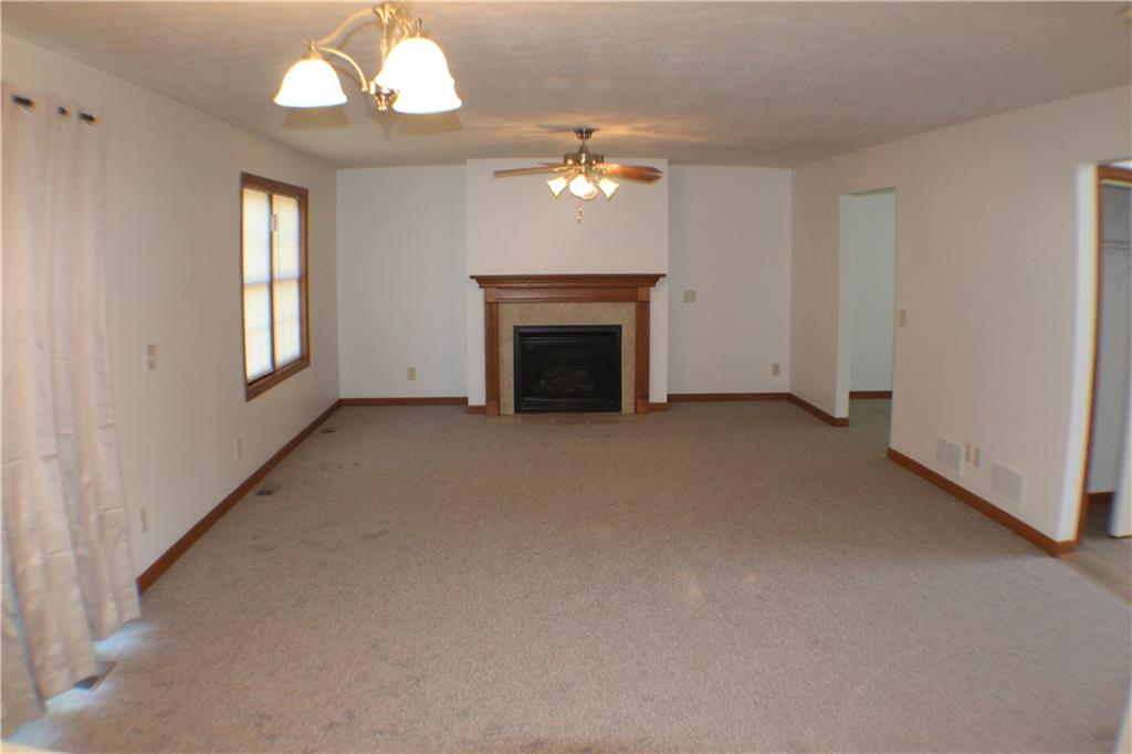 32 Intermediate Drive Coal Center, PA 15423 - Photo 11 of 36 Huge 27x15 family room has an area for a breakfast table in front of the sliding glass doors.