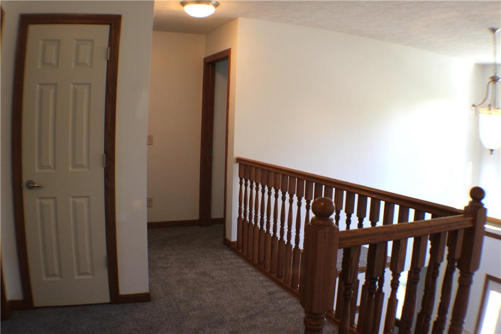 32 Intermediate Drive Coal Center, PA 15423 - Photo 22 of 36 Spacious hallway between bedrooms is open to the foyer below.