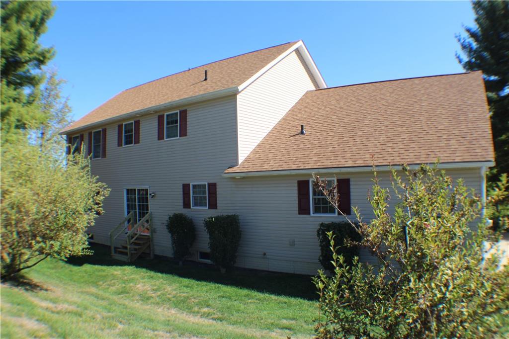 32 Intermediate Drive Coal Center, PA 15423 - Photo 34 of 36 Nice backyard wraps to the other side of the home.