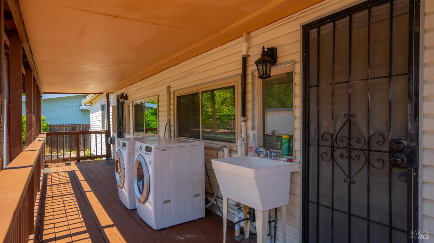 79 Billou Street San Rafael, CA 94901 - Photo 29 of 47 Shared laundry on back deck