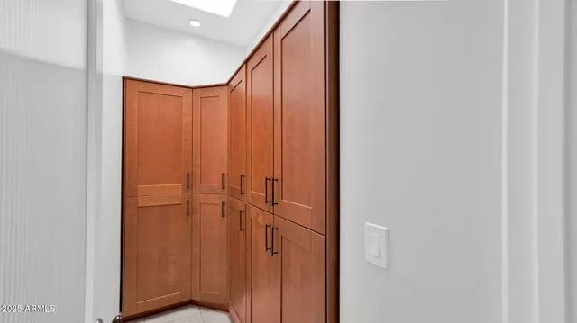 a bathroom with a shower and a mirror